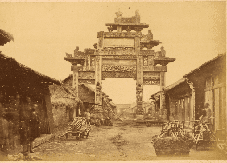 27 Ornamental Gateway Pailou from Han Dynasty 202 BCE 220 CE across a Street Lined with Small Shops Hanzhong Shaanxi Province China 1875 WDL2092